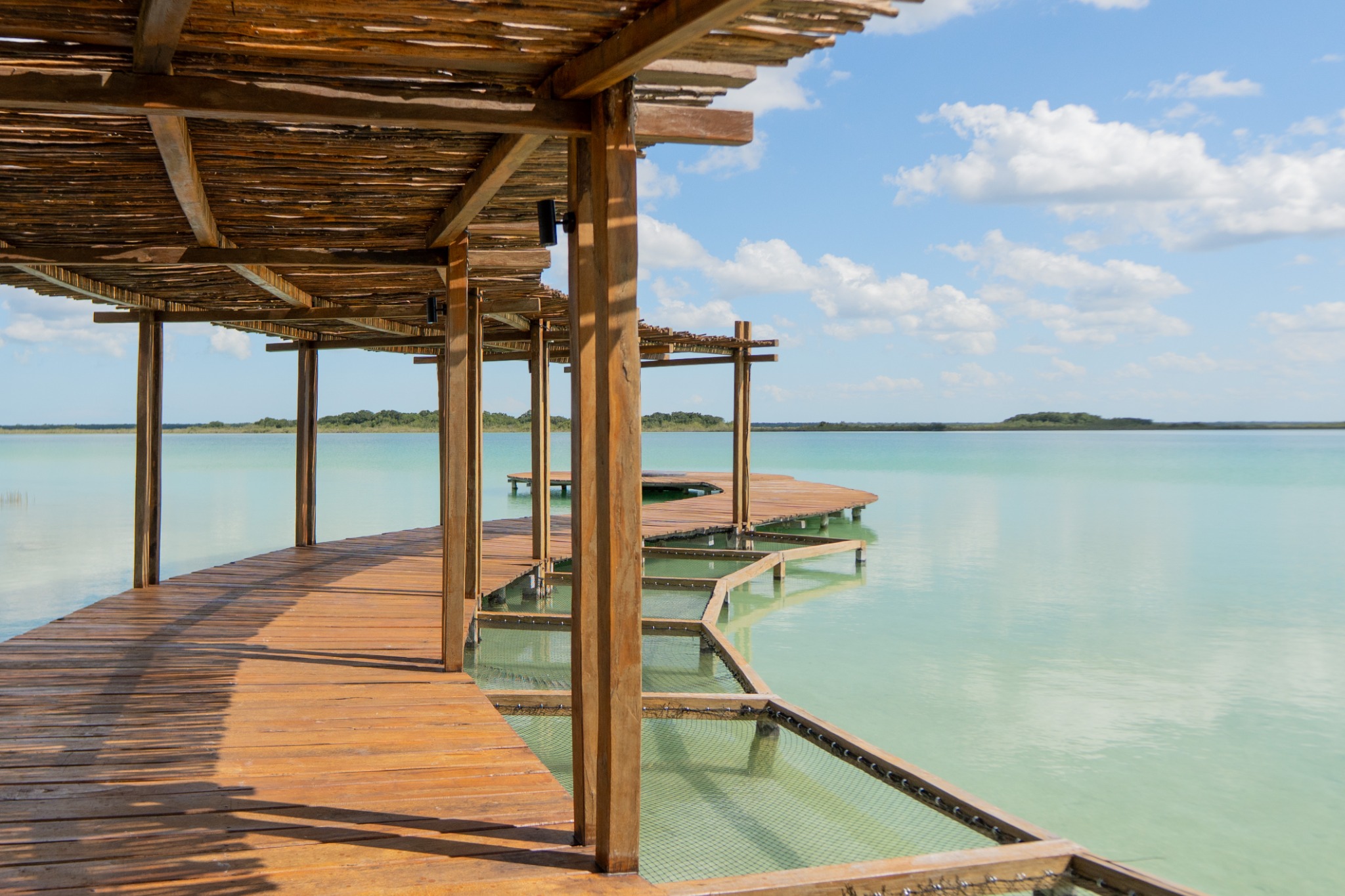 Dock overlooking the turquoise waters of Bacalar Lagoon